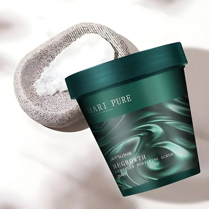 Récipient cylindrique vert contenant un produit de soin de la peau Hari Pure, avec un motif tourbillonnant sur l’étiquette.