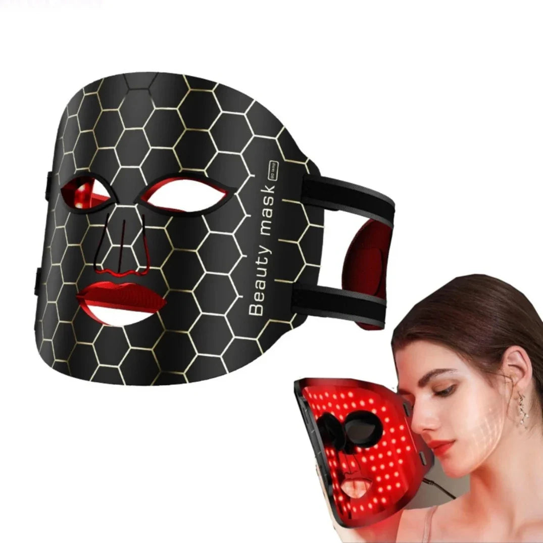 Masque facial noir à LED avec motif en nid d’abeille et accents rouges.