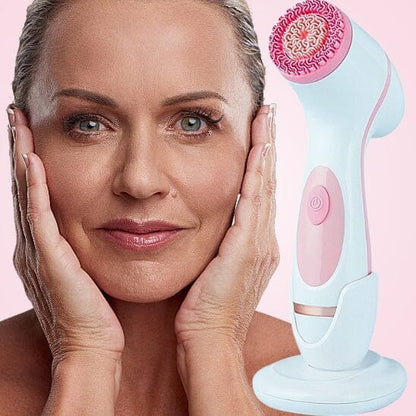 Brosse électrique nettoyante pour le visage avec un embout circulaire rose.