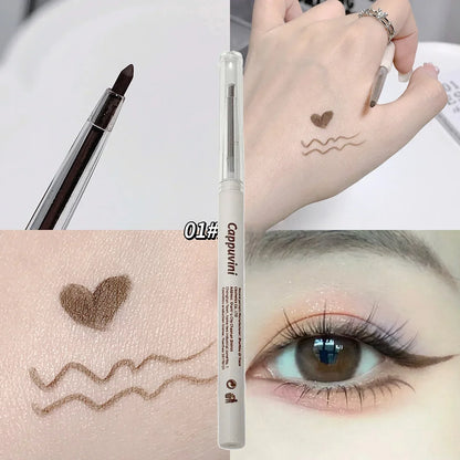 Stylo eye-liner marron utilisé pour dessiner un cœur et des lignes ondulées.