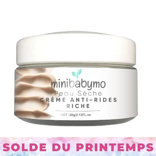 Pot de crème anti-rides Minibabumo avec couvercle blanc.