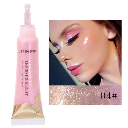 Tube de maquillage liquide surligneur rose avec une base dorée.