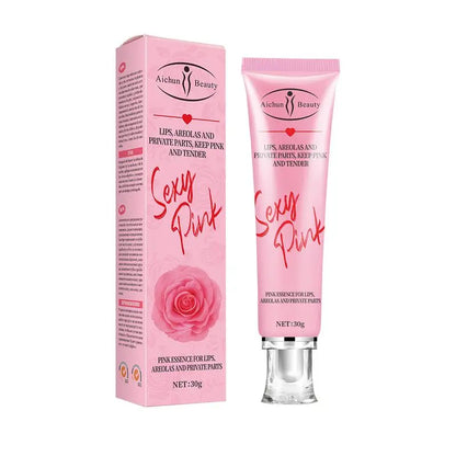 Tube de crème cosmétique rose avec sa boîte d’emballage de vente au détail ornée d’une rose.