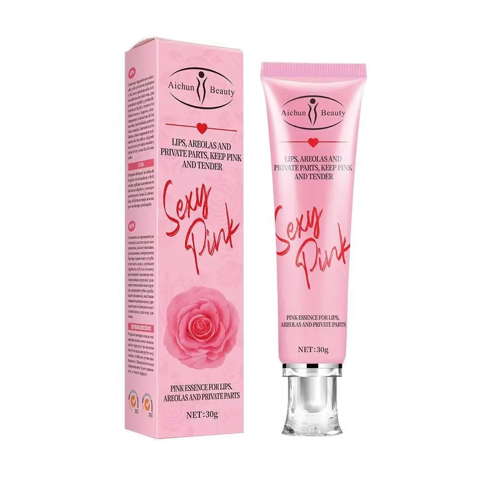 Tube et boîte de crème de soin rose avec la marque ’Sexy Pink’ et des images de roses.