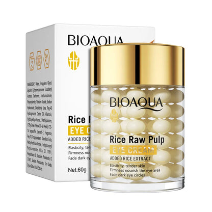 Pot en verre à couvercle doré de la crème pour les yeux Bioaqua Rice Raw Pulp avec sa boîte de produit.