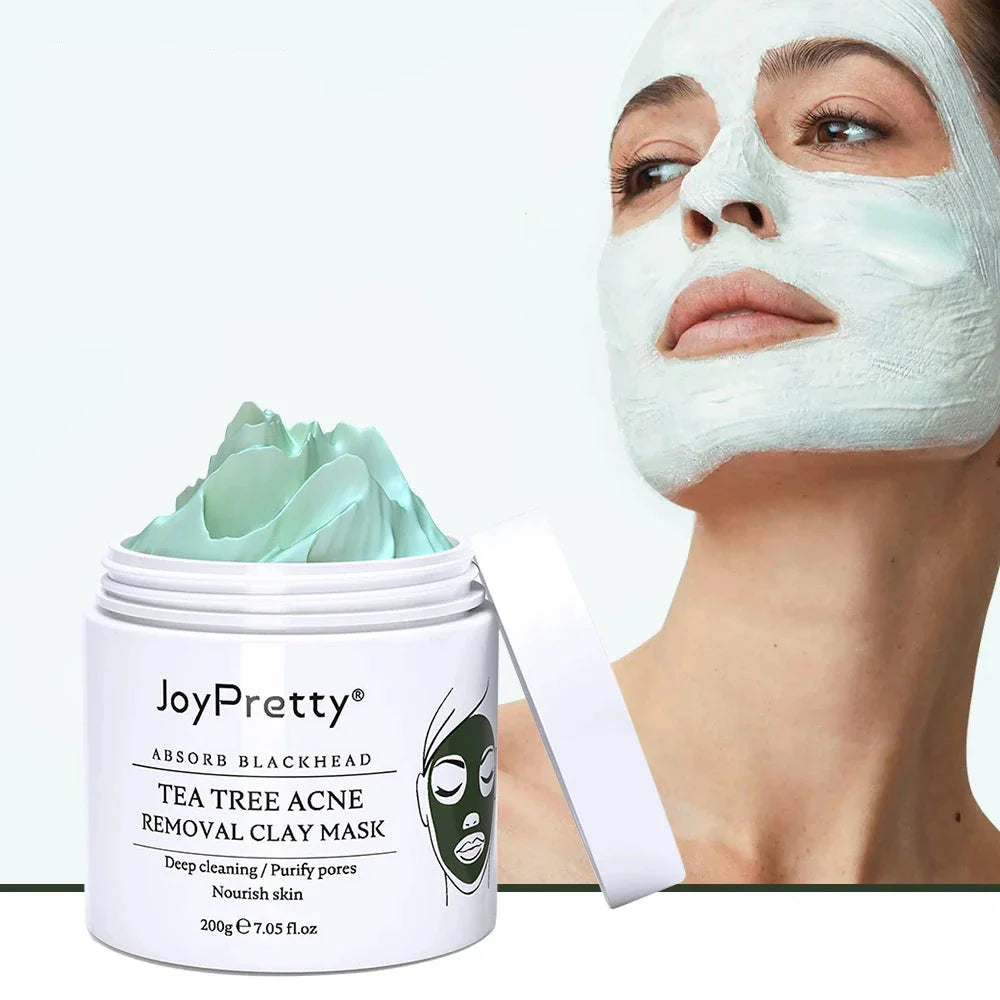 Pot blanc de JoyPretty Tea Tree Acne Removal Clay Mask avec le produit vert menthe visible sur le dessus.