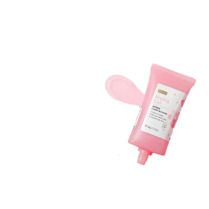 Tube de produit cosmétique ou de soin rose avec une trace de produit à côté.