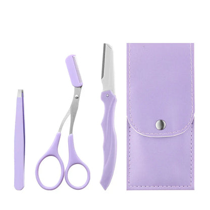 Set de manucure violet avec ciseaux, pince à épiler et outils pour les ongles dans un étui assorti.