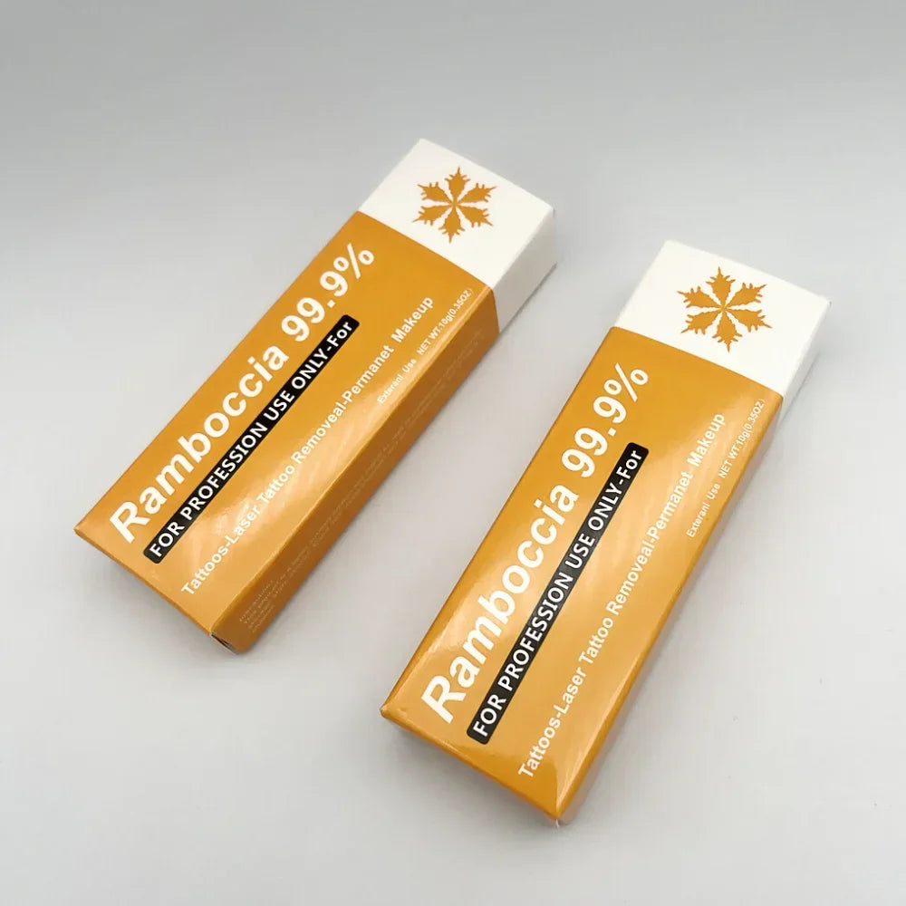 Deux boîtes orange et blanches de barres chocolatées 90% Rainforest.