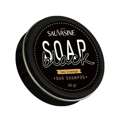 Boîte ronde noire de savon shampoing Saunasine avec inscription blanche.