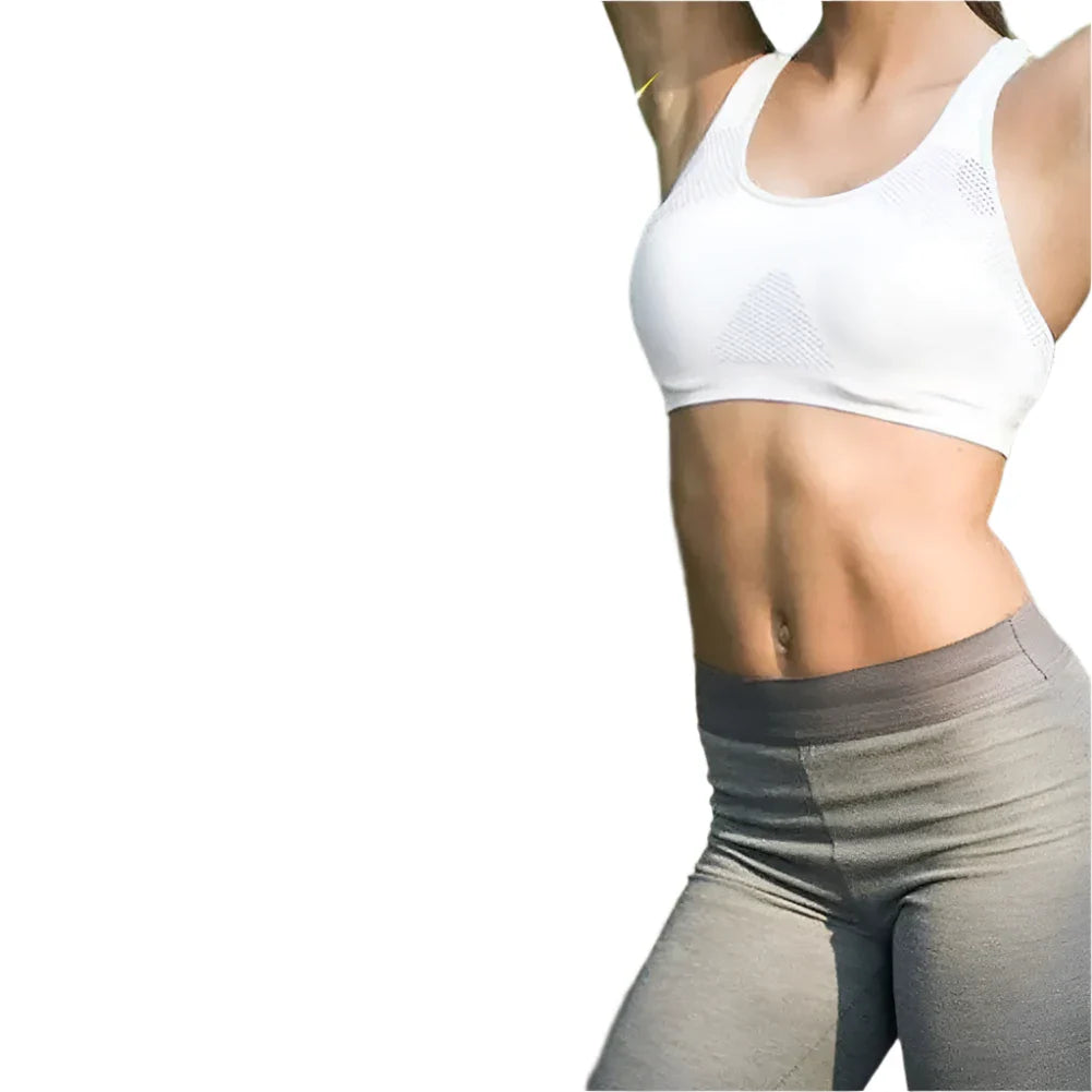 Figure athlétique portant un soutien-gorge de sport blanc et un legging gris.