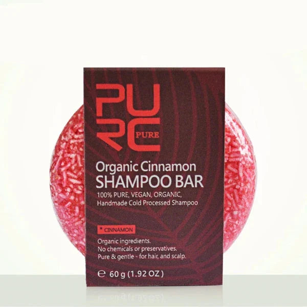 Barre de shampoing bio à la cannelle rouge avec une étiquette de produit marron.