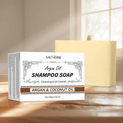 Savon shampoing en boîte blanche contenant des huiles d’argan et de coco.