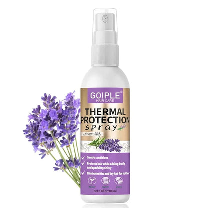 Flacon pulvérisateur blanc du spray de protection thermique Goiple avec des fleurs de lavande à côté.